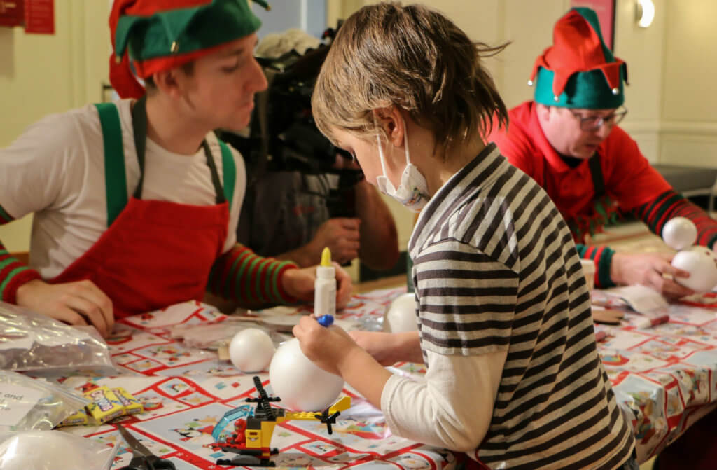 The elves deliver some pre-Christmas joy to young patients and their families. Steve Bigg Photo