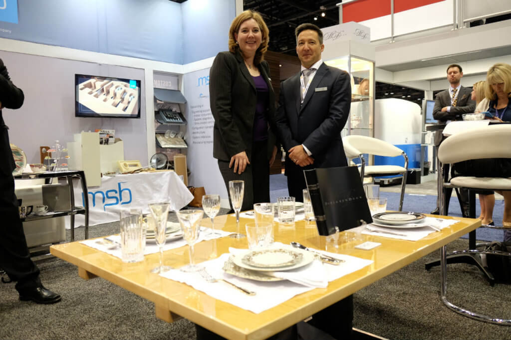 Shannon Gill, director of business development for MSB Design, stands with Mario Sévigny, the company's vice-president, next to one of the company's new tables. Ben Forrest Photo