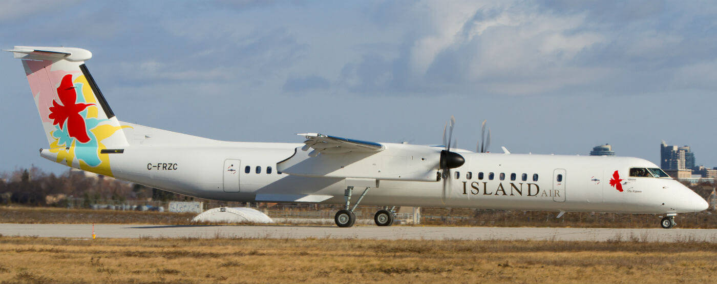 The first of three new Q400NGs for Island Air is seen taking off on its first test flight from Toronto Downsview Airport on Dec. 9 2016. It is named 'Ola Kupono" on the nose. Andy Cline Photo