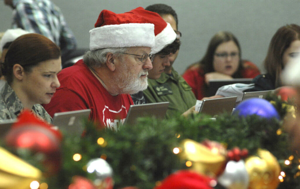 About 1,500 volunteers contribute to NORAD Tracks Santa, with many serving as operators who answer calls from children about Santa's whereabouts on New Year's Eve. NORAD Photo