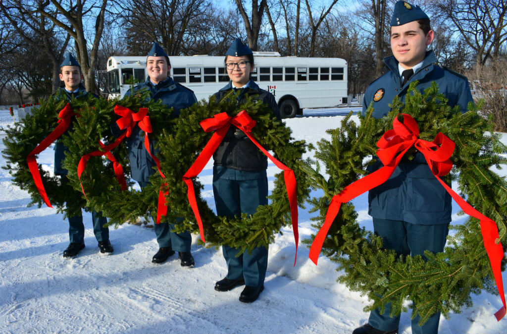 Volunteers from the Canadian Armed Forces, Canadian Cadet Organizations, the Knights of Columbus and the City of Winnipeg, as well as local businesses took part in and supported Winnipeg's second Wreaths Across Canada event in early December 2015. Here, Royal Canadian Air Cadets wait to lay wreaths at the graves of Canadian Armed Forces personnel in Brookside Cemetery's Field of Honour. DND Photo