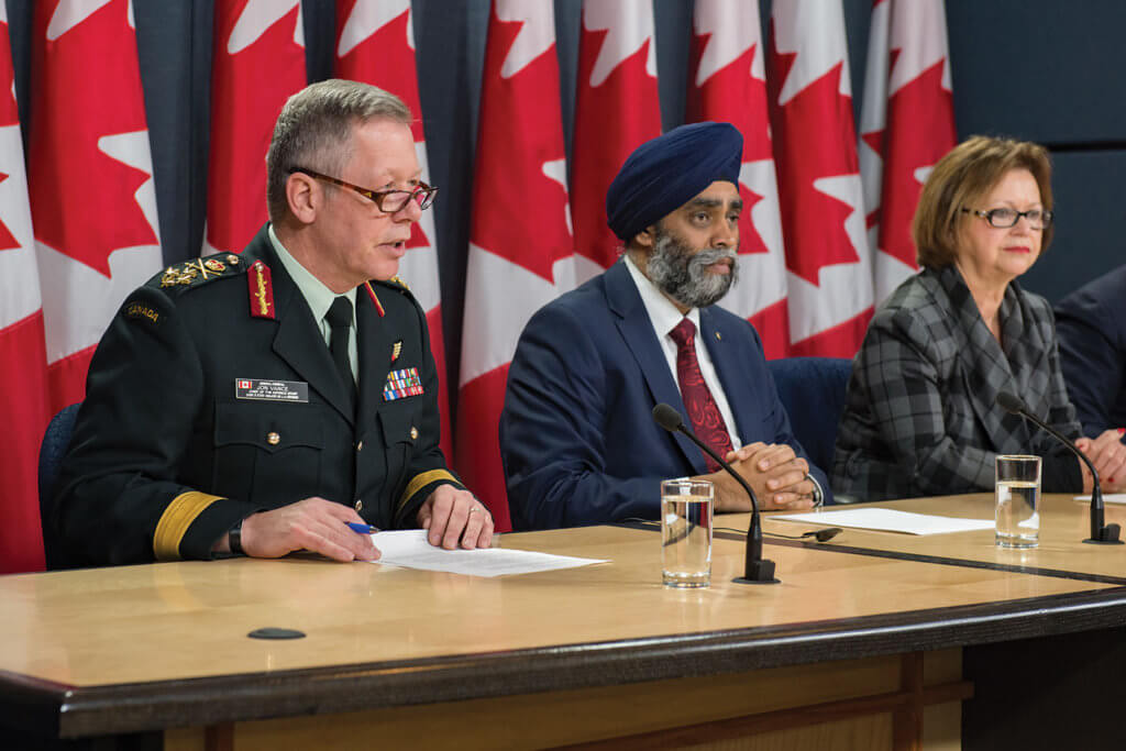 (L-R) Gen Jonathan Vance and Ministers Harjit Sajjan and Judy Foote announce plans to explore a Super Hornet purchase. Cpl Mark Schombs Photo