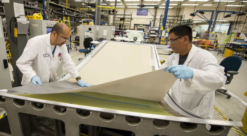 Staff at Boeing Winnipeg prepare for the fiberglass layup process. The company was asked to provide a detailed outline of the industrial and technological benefits Canada could expect in association with an interim Super Hornet fighter jet purchase. Bob Ferguson Photo