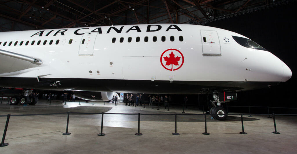 Photo of front portion of Air Canada airliner with new livery.