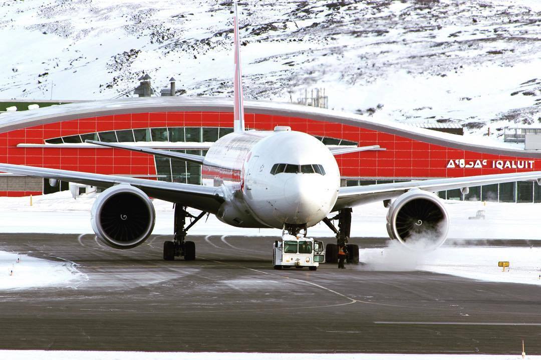 A SWISS Boeing 777-300ER is towed to conduct engine runs after a new engine was installed during an emergency stop in Iqaluit recently. Photo submitted by Brian Tattuinee