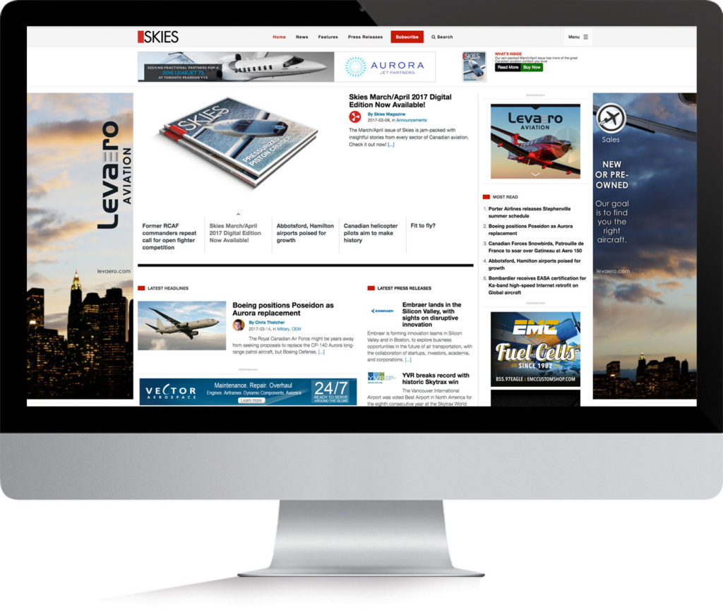 Desktop computer with screen shot of Skiesmag.com homepage