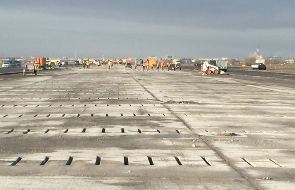 Rehabilitation work on the runway itself includes cutting multiple incisions, like those shown here.