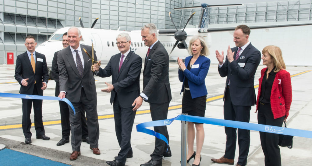 The Honourable Marc Garneau, Minister of Transport joins PortsToronto CEO Geoffrey Wilson and PortsToronto chair Robert Poirier to cut the ribbon to officially open the new ground run-up enclosure at Billy Bishop Toronto City Airport. PortsToronto Photo