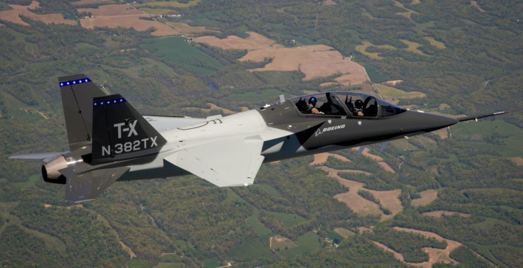 During the one-hour flight, lead T-X test pilot Steve Schmidt and Boeing test pilot for Air Force Programs Matt Giese validated key aspects of the aircraft and further demonstrated the low-risk and performance of the design, proving its repeatability in manufacturing. Boeing Photo