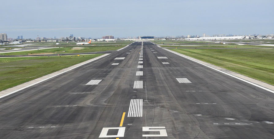 The completed work on Runway 05/23 included removing the existing paved surface, subsurface repair and re-paving, as well as reconditioning of 1,000 inset runway lights and the replacement of 420 kilometres of single-line paint markings. Toronto Pearson Photo