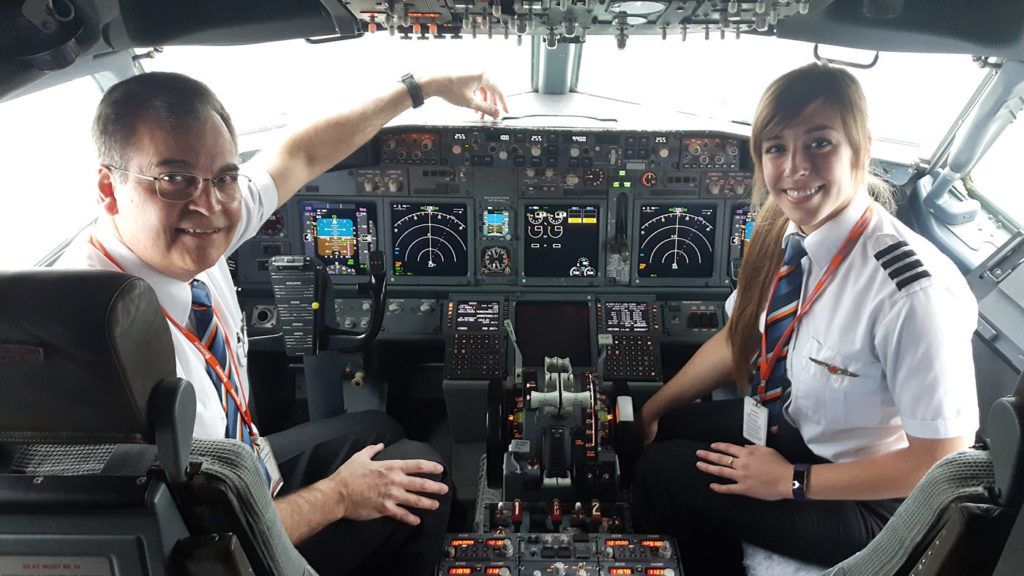 Sunwing's Capt John Hudson and First Officer Chelsea Anne Edwards flew one of the airline's Boeing 737-800s into Waterloo Airport on Feb. 23. Edwards is one of six direct-entry cadets hired by Sunwing last year. WWFC Photo