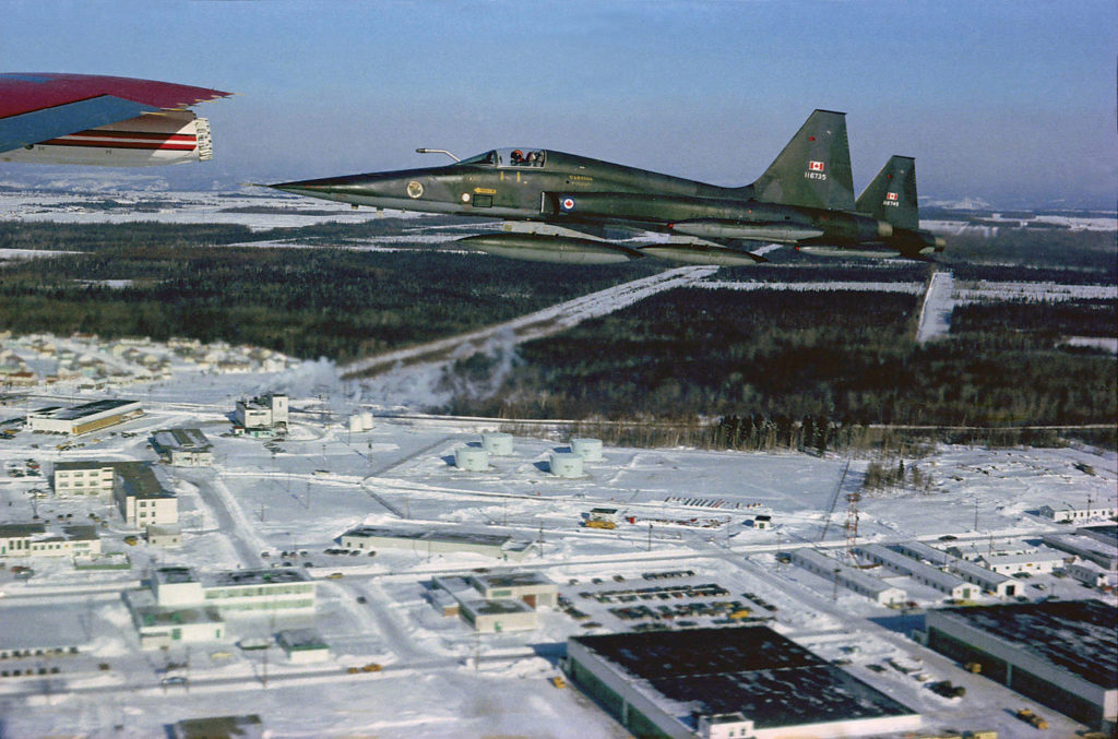 A low altitude flypast performed by two CF-5s of No. 433 TFS at Bagotville, January 1973. Capt Jean-Pierre Ferron Photo