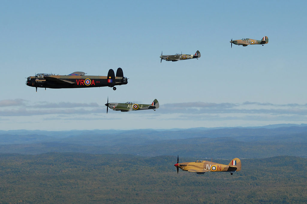 The Canadian Warplane Heritage Museum Avro Lancaster X leads four Second World War vintage fighters. On the left wing flies the Spitfire XVI and Hurricane IV of the Michael Potter Collection, while on the right wing fly another Spitfire and Hurricane from the now-defunct Russell Collection of Niagara Falls, Ont. Peter Handley Photo