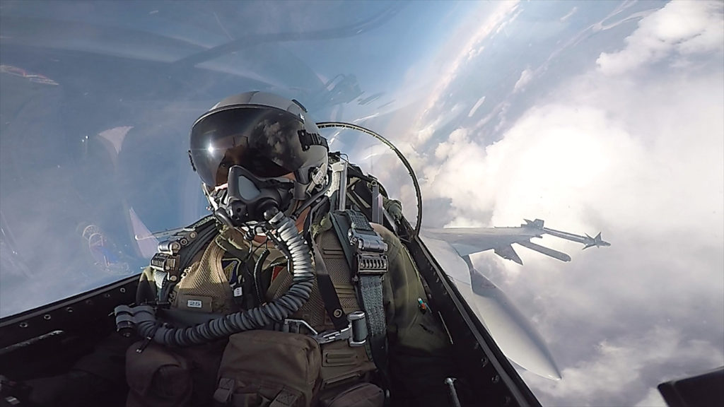 USAF Capt Todd Possemato, an 18th Aggressor Squadron pilot, flies an F-16 Fighting Falcon as a 