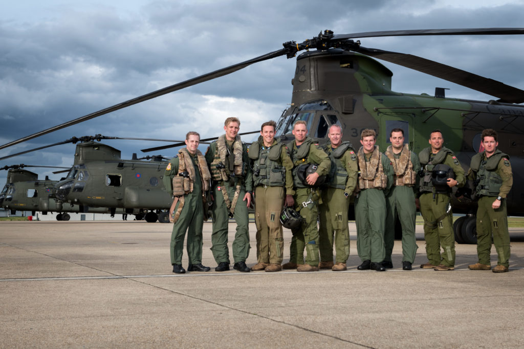 Crews from 18(B) Squadron of the RAF and 450 Tactical Helicopter Squadron pose with their aircraft following a unique sortie over to the Canadian National Vimy Memorial and the D-Day beaches. Lloyd Horgan Photo