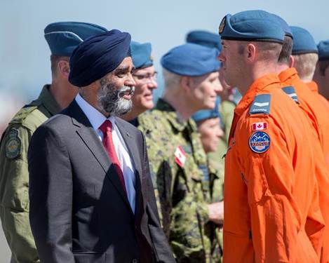 Defence Minister Harjit S. Sajjan and Royal Canadian Air Force leaders welcomed 11 new search and rescue technicians into their trade on July 6, at 19 Wing Comox, B.C. National Defence Photo 