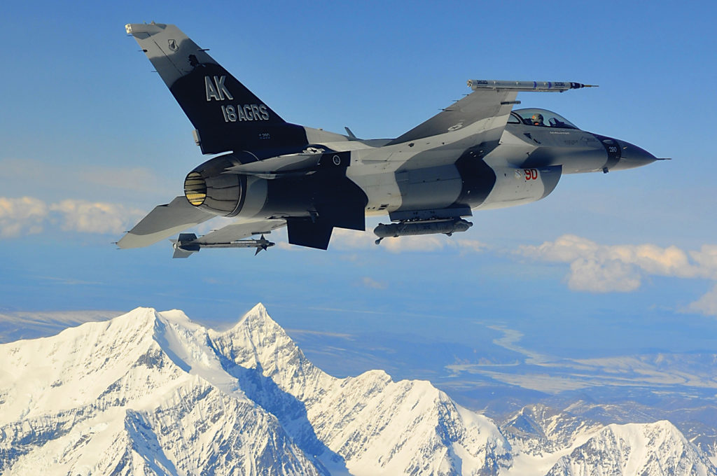 An F-16 from the 18th Aggressor Squadron soars over the Joint Pacific Alaska Range Complex. The squadron is responsible for training and preparing joint and allied aircrews for combat missions. Staff Sgt Christopher Boitz Photo