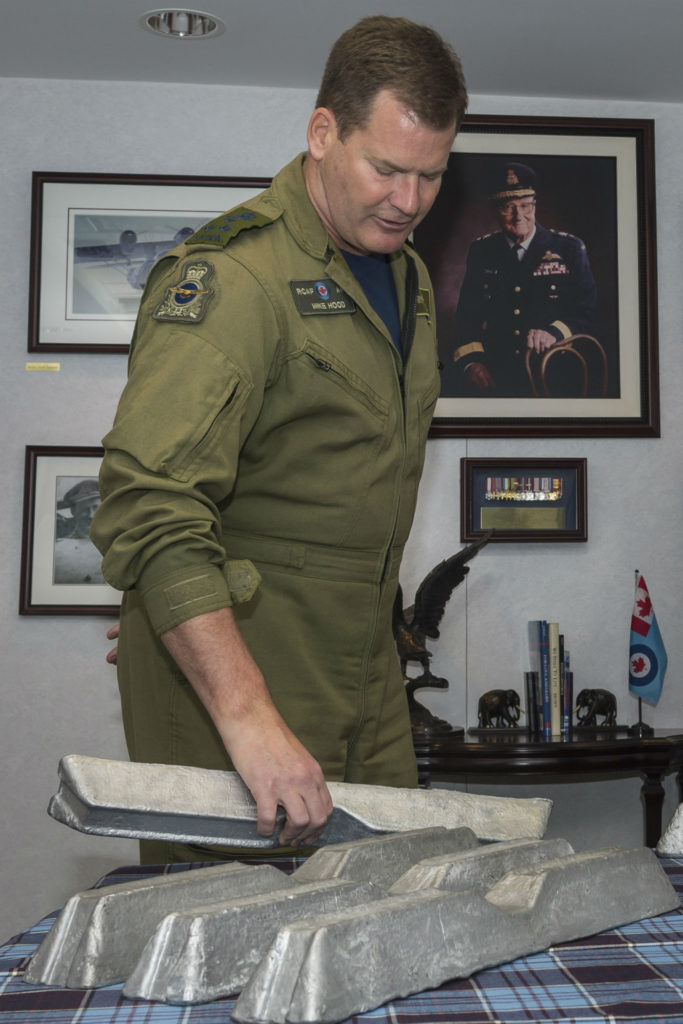 LGen Mike Hood, commander of the Royal Canadian Air Force, accepted the donation of aluminum alloy ingots from Halifax 57 Rescue (Canada) and the Bomber Command Museum of Canada in June 2017. The aluminum is from Halifax bomber LW682, which was shot down in Belgium in May 1944. Cpl Alana Morin Photos