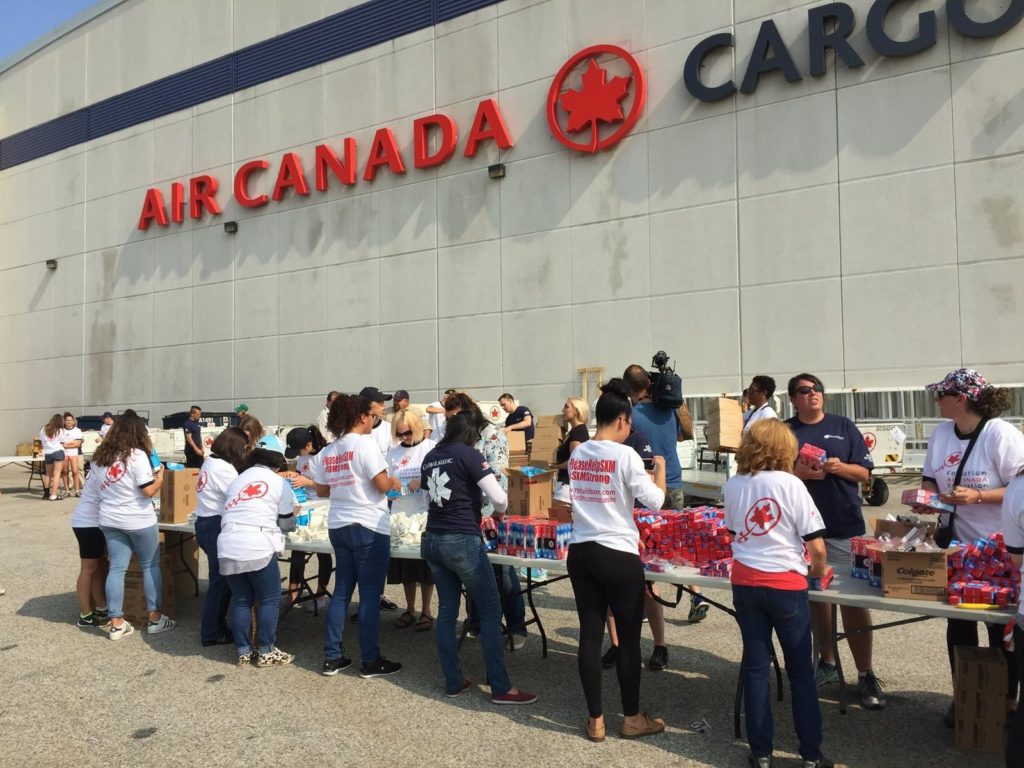 Air Canada Foundation employee and family members make care packages.
