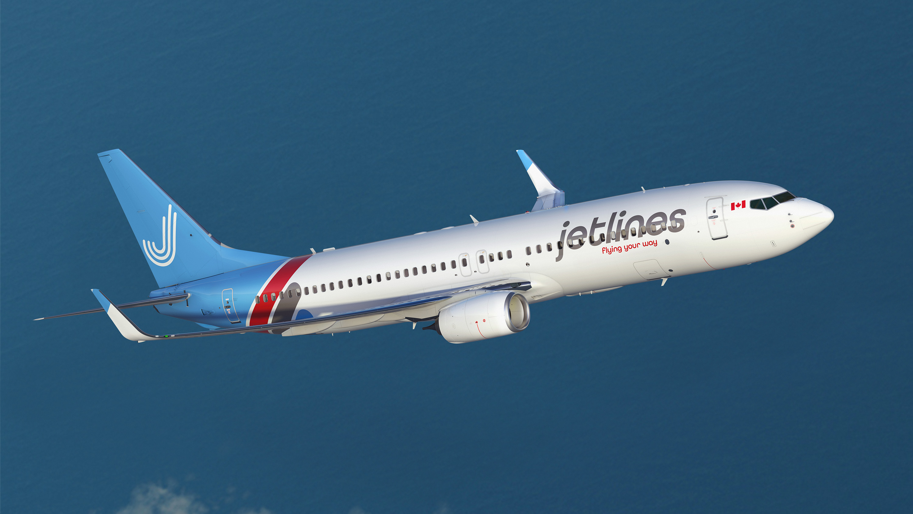 Airplane in Canada Jetlines livery, in filght