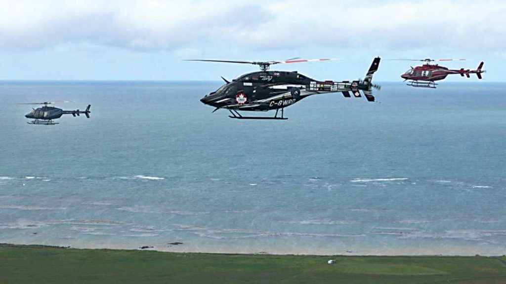 Bob's Bell 429 (centre) flies in formation over Iceland.