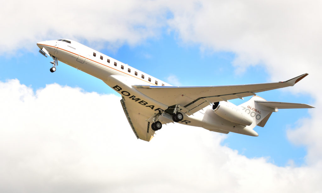 Bombardier Global 7000 jet soaring through sky