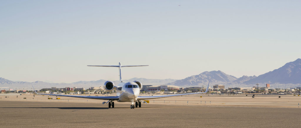 Gulfstream G650ER rests on runway.