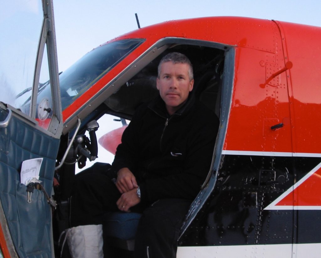 Sean Loutitt sits in his aircraft in this photo from from his 2003 flight to the South Pole. 