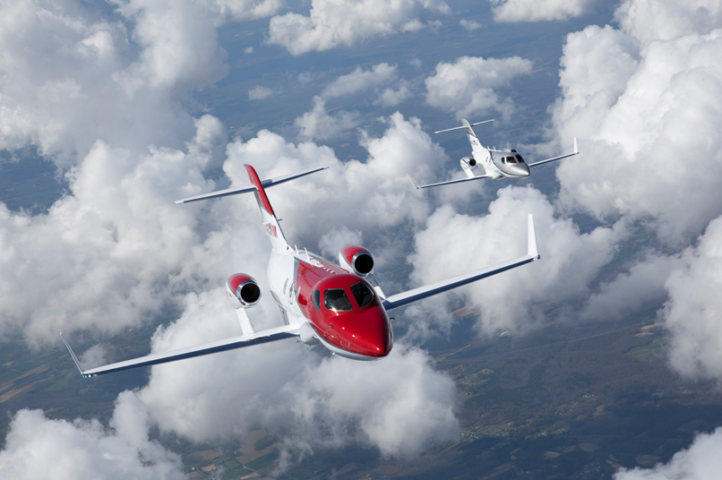 Two Hondajets in flight