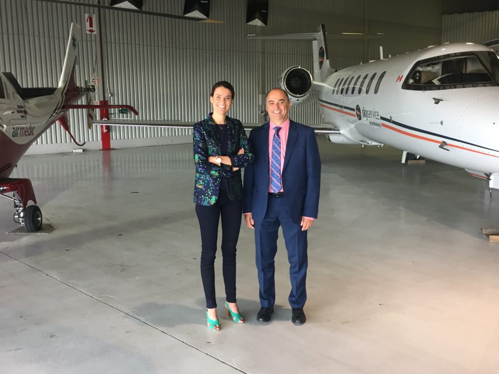 Sophie Larochelle, Airmedic executive vice-president, stands with  Sam Cimone, president of Skyservice Air Ambulance International. The two companies have combined resources to offer comprehensive critical care air ambulance service. Airmedic Photo
