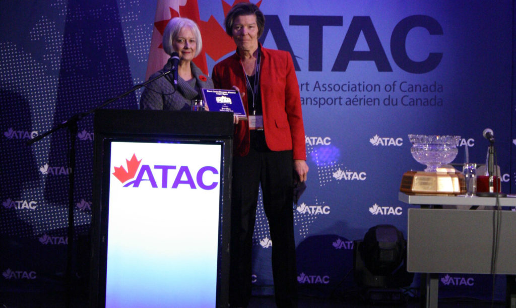Abramson presents the DCAM Legacy Award to winner Janet Keim, flight instructor at Mitchinson Flight Centre in Saskatoon, Sask. 