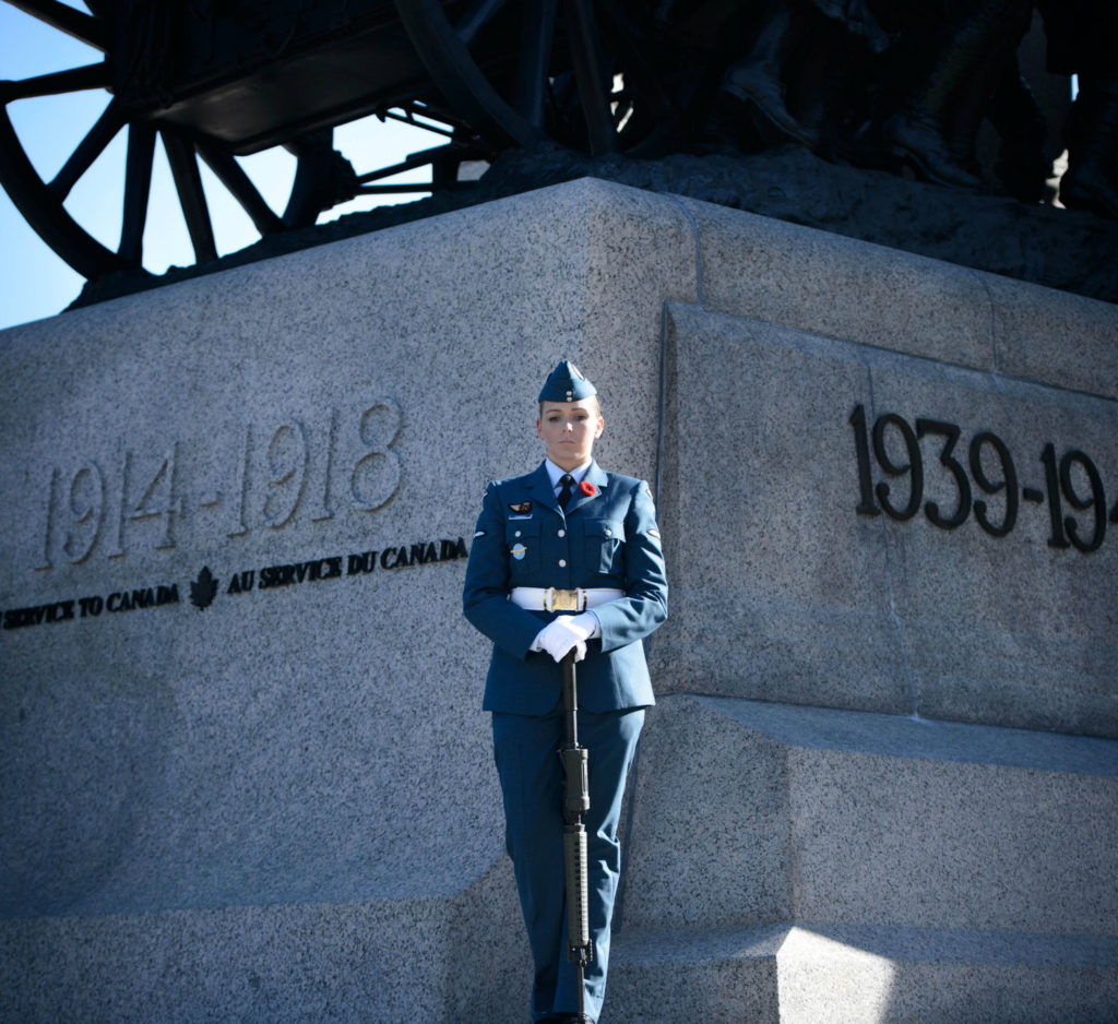 Aviator Sarah Comeau stands at National War Memorial