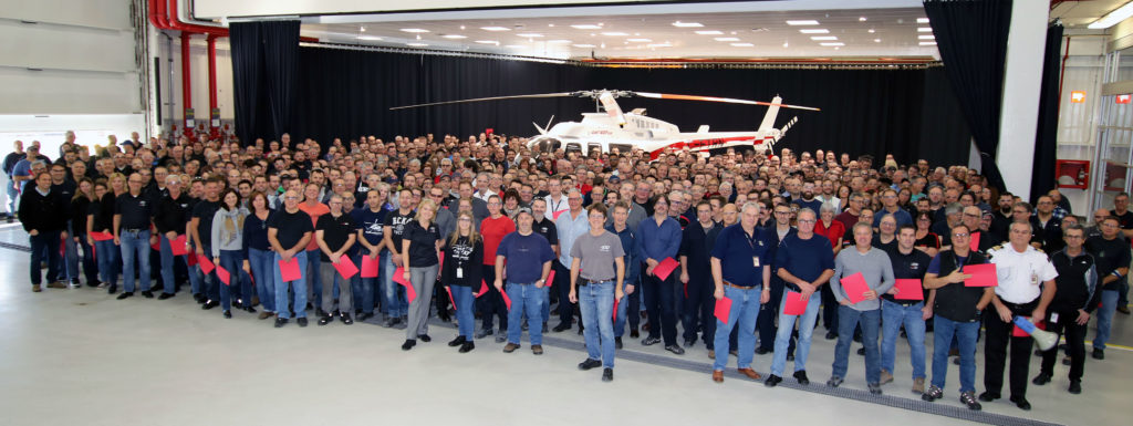 All Bell Helicopter Mirabel employees gathered around the 5,000th aircraft in the facility's delivery center for a special ceremony.