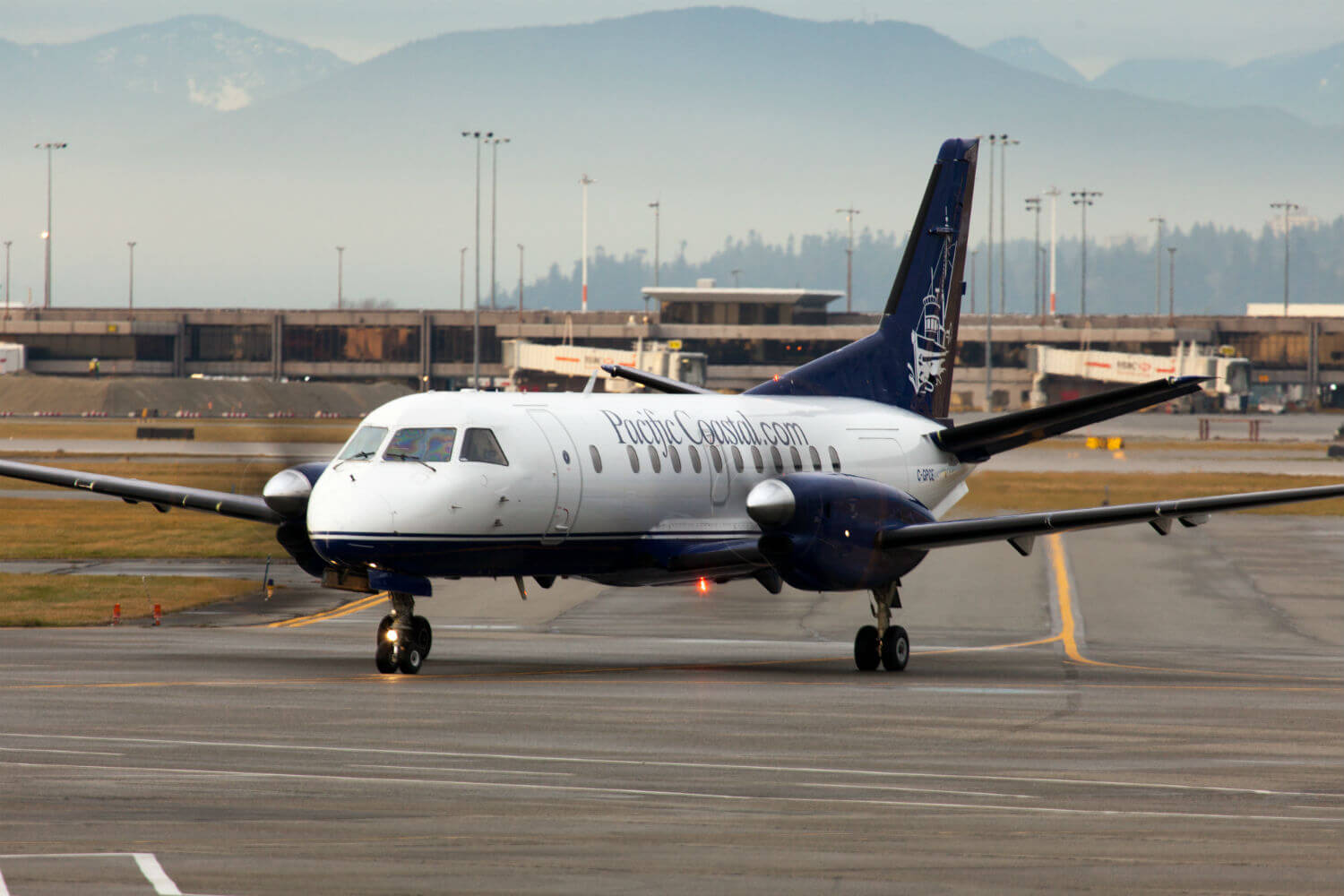 Pacific Coastal Saab 340B aircraft on ground