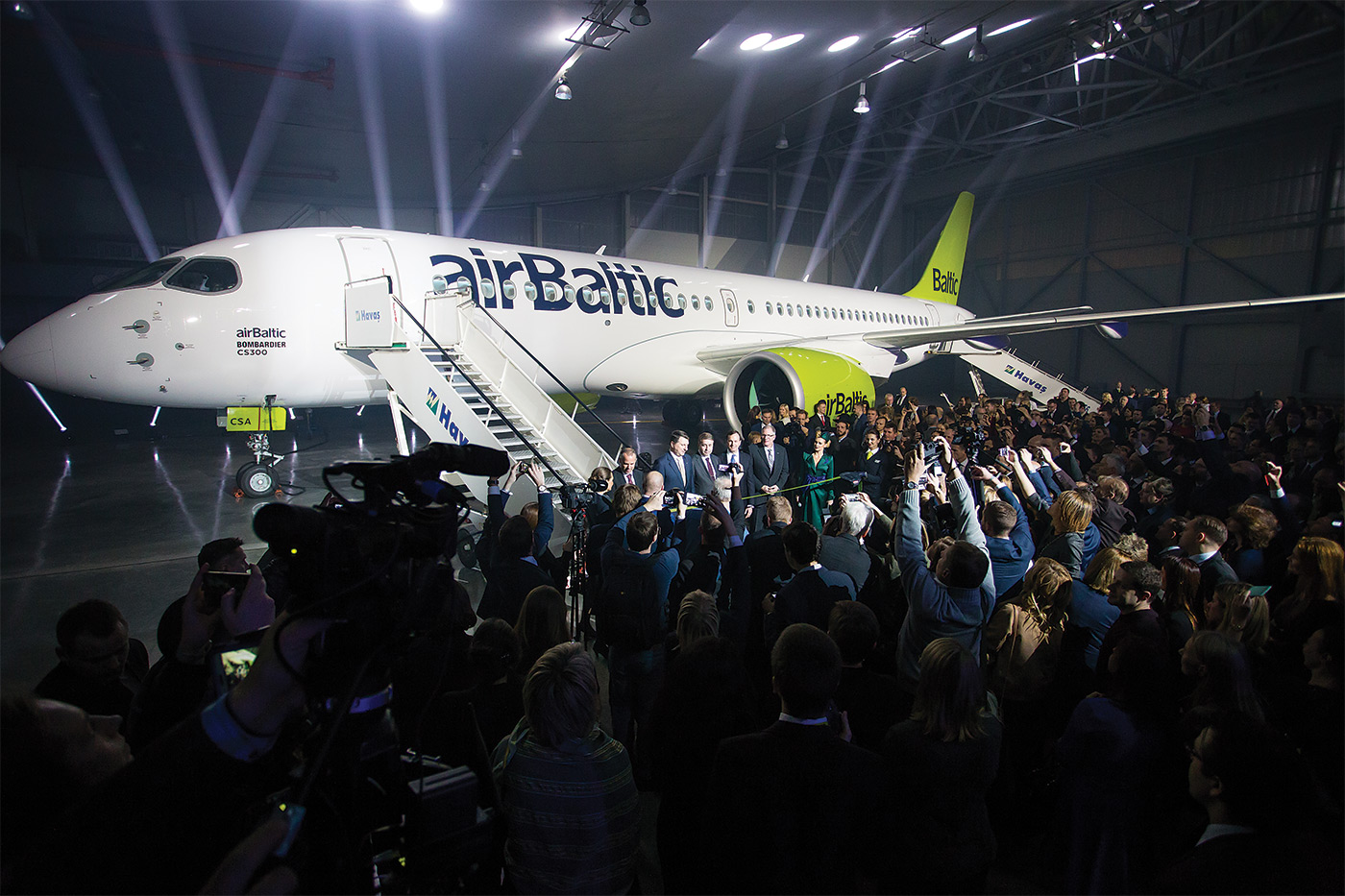 airBaltic CS300 rests on ground