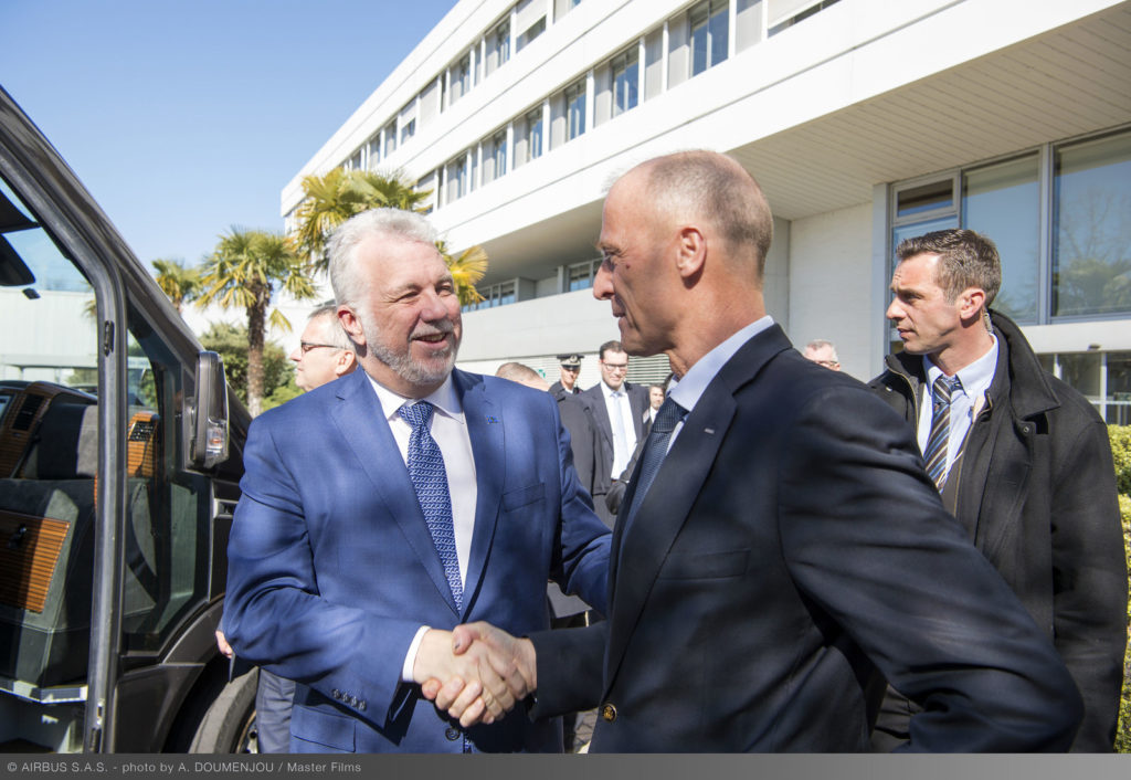 Couillard shakes hands with Enders