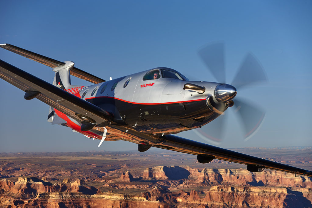 Aerial photography of the 2016 Pilatus PC-12 NG with the new Hartzell 5 blade graphite composite propeller flying over Lake Powell.