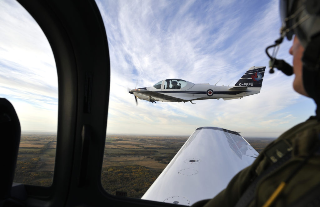 A Grob G-120A aircraft conducts a training flight near the Southport Aerospace Centre in Portage la Prairie, Man. on Oct. 10, 2013.