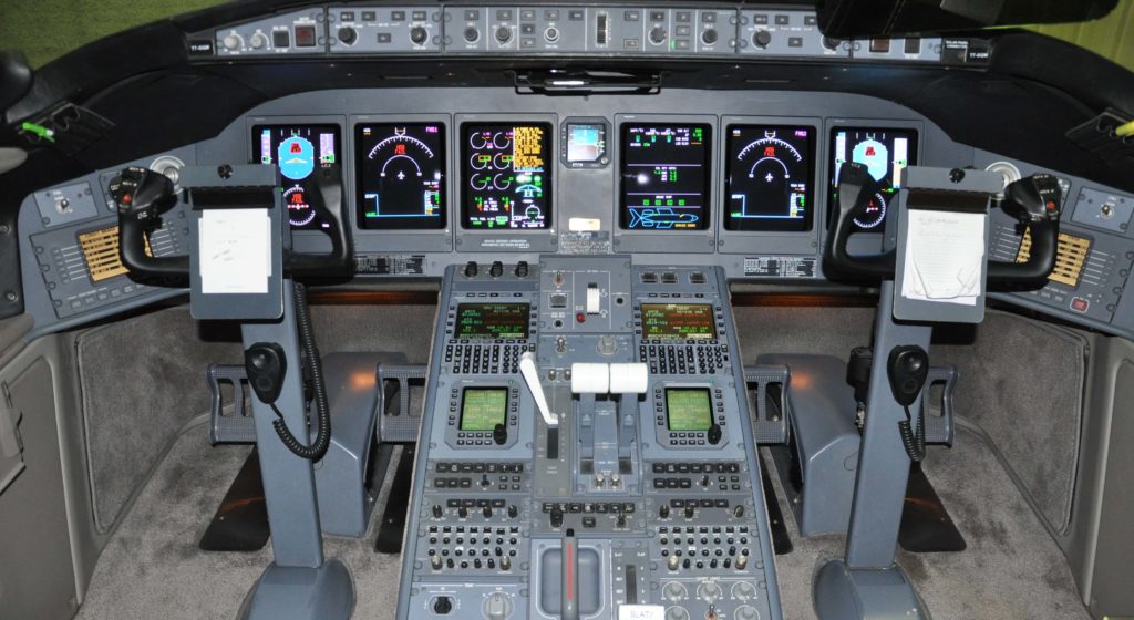 Interior view of aircraft cockpit.