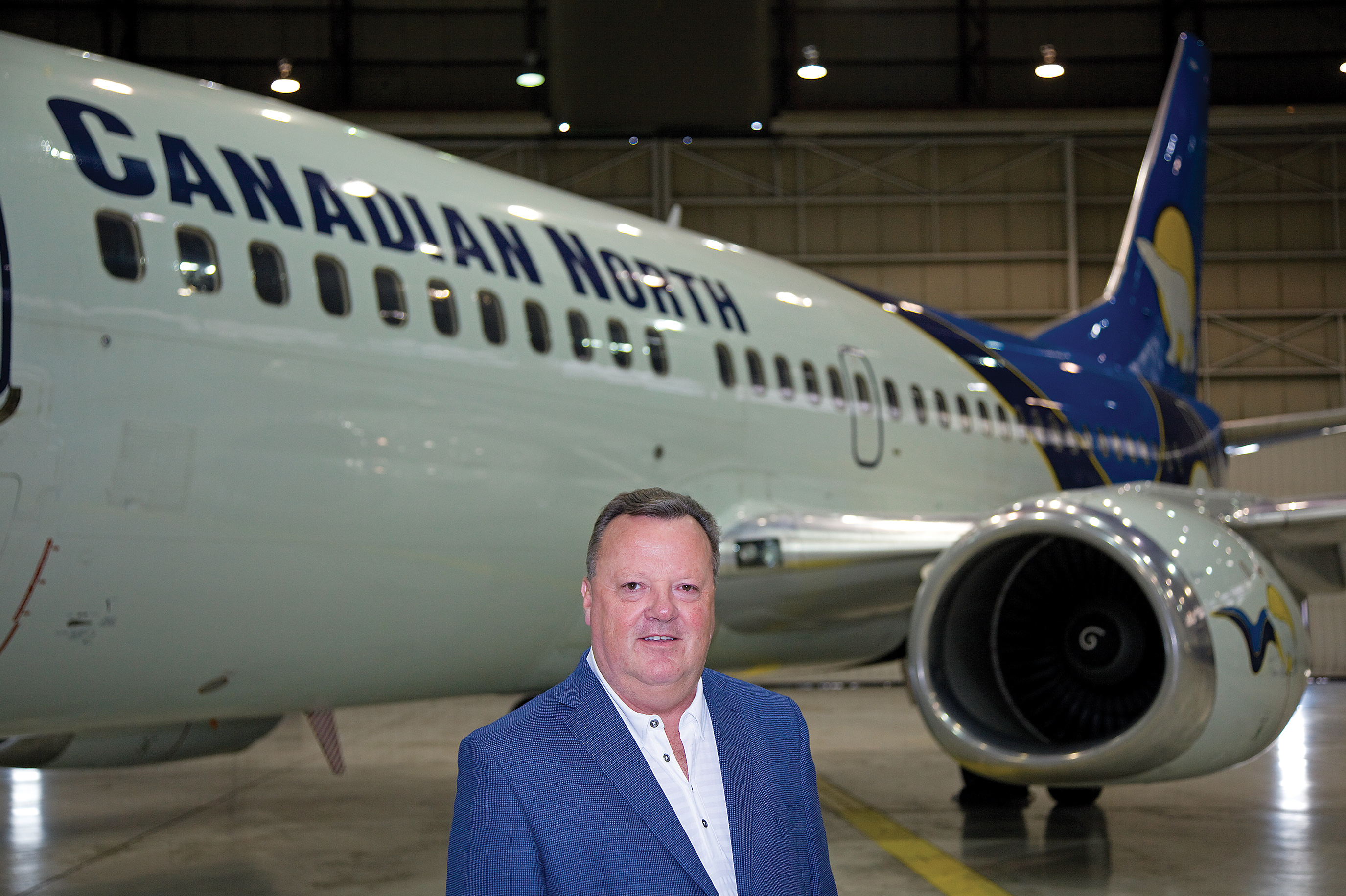 Hankirk stands in front of Canadian North airliner