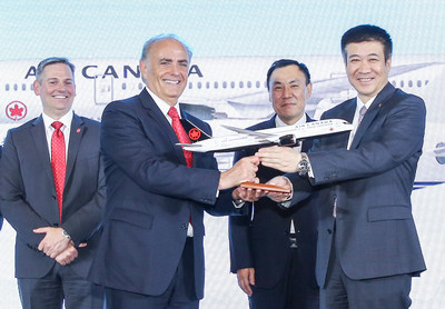 From left, Craig Landry, senior vice president of revenue optimization at Air Canada; Calin Rovinescu, president and CEO of Air Canada; Jianjiang Cai, chairman of Air China; and Zhiyong Song, president of Air China celebrate the new joint venture and longstanding partnership. Air Canada Photo