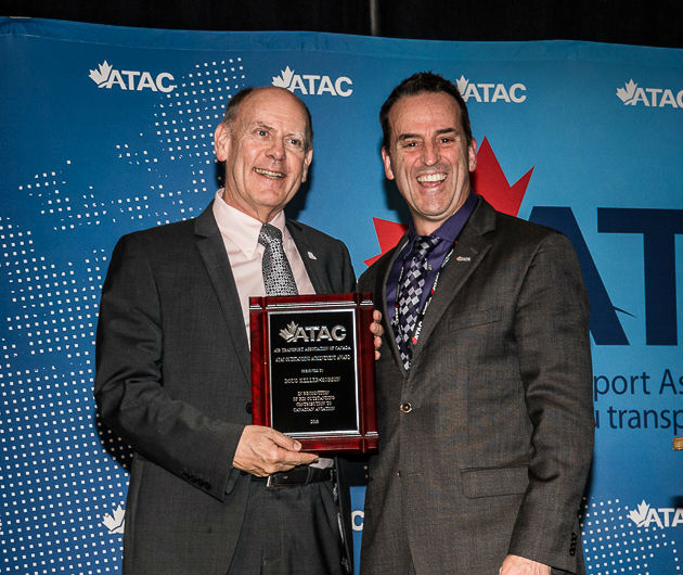 Hope Air's Doug Keller-Hobson, left, received the Air Transport Association of Canada's 2018 Outstanding Achievement Award from ATAC director Patrick Coulter. The award honours the work Keller-Hobson has done to connect Canadians with the medical care they need. ATAC Photo