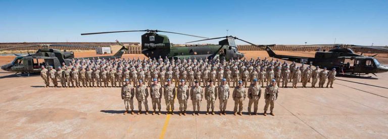 Members of the Canadian Armed Forces deployed to Mali pose for a group photo on their ramp in Gao. DND Photo