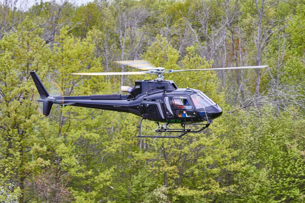 The aircraft has been outfitted with a glass cockpit, customized avionics, certified rupture-resistant fuel tank, cargo pods, high-visibility doors, cargo swing, cargo mirror, enlarged floor window and litter kit. Vitek Zawada/Airbus Canada Helicopters Photo