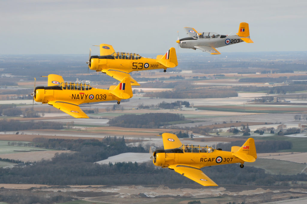 The Canadian Harvard Aerobatic Team flies over Woodstock, Ont. Eric Dumigan Photo
