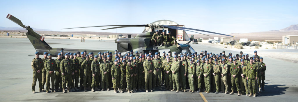 Members of 408 Tactical Helicopter Squadron stand for a group photo at Marine Corps Air Ground Combat Centre Twentynine Palms, Calif., on Nov. 11, 2019. Cpl Desiree T. Bourdon/RCAF Photo