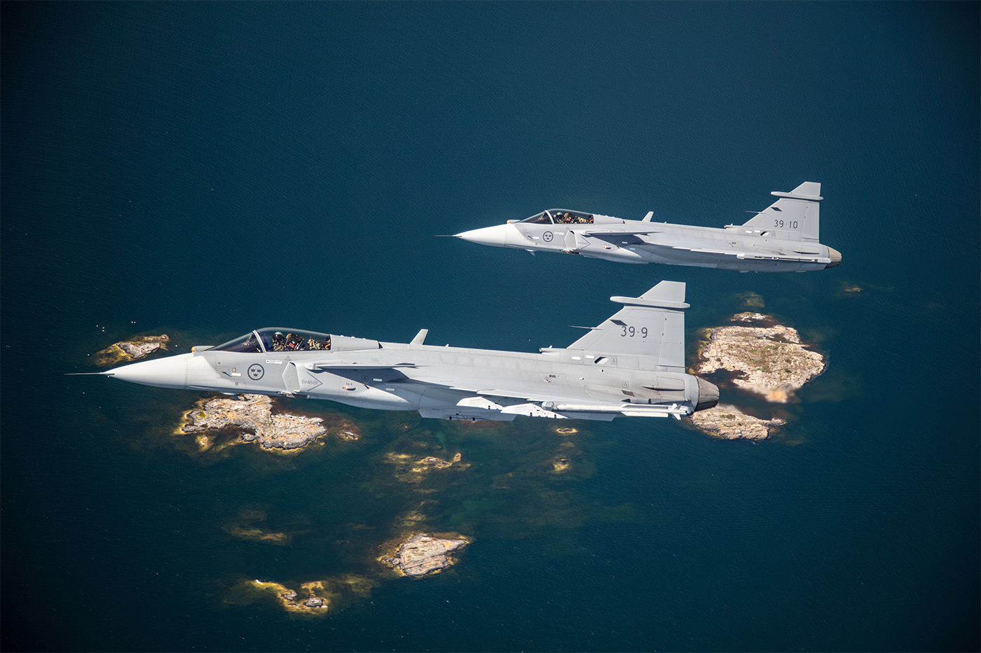 Two of Saab's three flying Gripen E test aircraft, 39-9 and 39-10. The test program of four aircraft has accumulated over 150 hours. Saab Photo