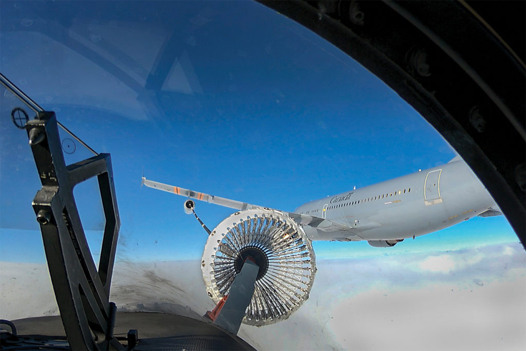 The Super Hornet offers a unique feature: It can serve as its own tanker. A fifth jet can be added to a four-ship team to extend the legs of a mission. Here, an RCAF CF-188 Hornet refuels from a CC-150 Polaris tanker. LS Erica Seymour Photo