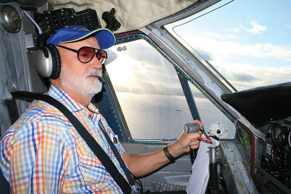 Bob Ambrose at the controls during an early morning departure from Honolulu, Hawaii to Majuro, Marshall Islands.