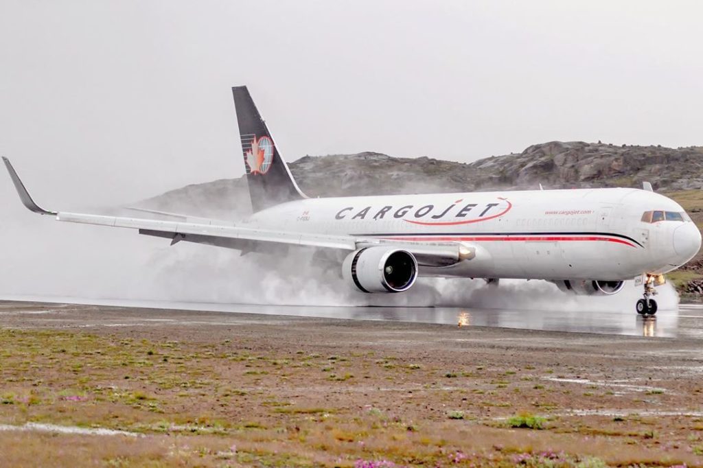 A Cargojet Boeing 767 splashes down in Iqaluit. Photo submitted by Brian Tattuinee (Instagram user @tattuinee) using #skiesmag.